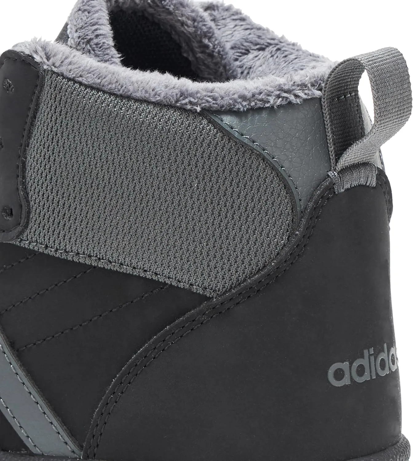 adidas Unisex-Child Turnaround Mid Top Basketball Sneaker